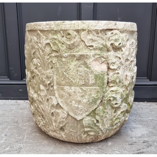 1140 - A large and impressive Italian carved limestone urn, probably 17th century or earlier, decorated wit...