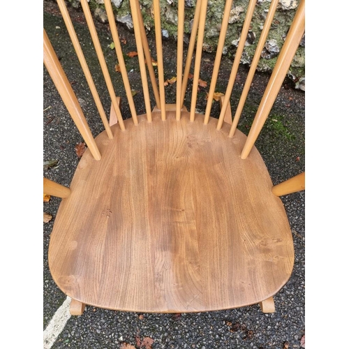 1079 - A vintage Ercol rocking chair. 