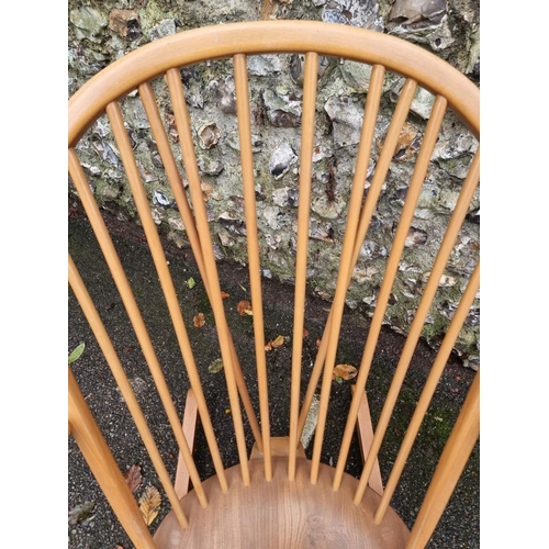 1079 - A vintage Ercol rocking chair. 