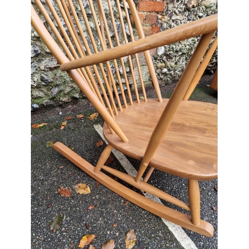 1079 - A vintage Ercol rocking chair. 