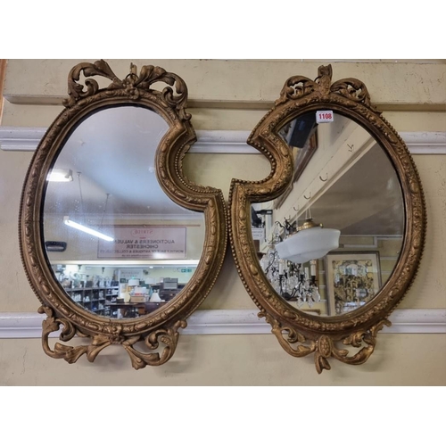 1101 - A near pair of unusual 19th century giltwood framed asymmetric wall mirrors, 53.5 x 36.5cm.... 