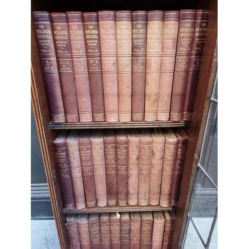 1060 - Books: The Encyclopaedia Britannica, 11th ed, 32 vols, in original oak bookcase, 36cm wide.... 