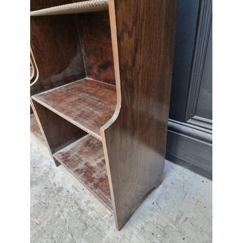 1061 - A small pair of 1920s oak open bookcases, each with frieze drawer, 38cm wide.