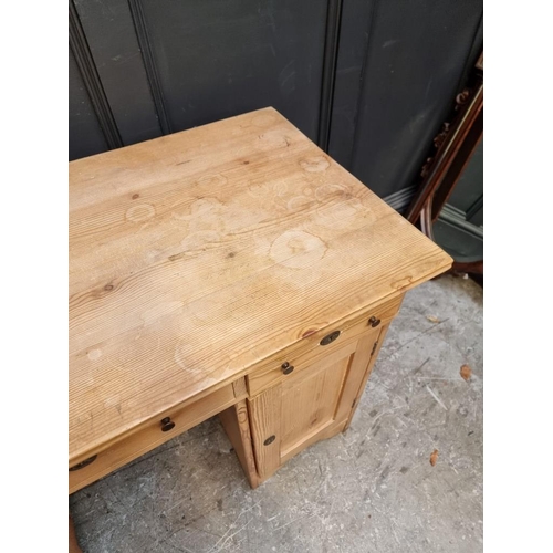 1066 - An antique Continental pine pedestal desk, 120cm wide.  