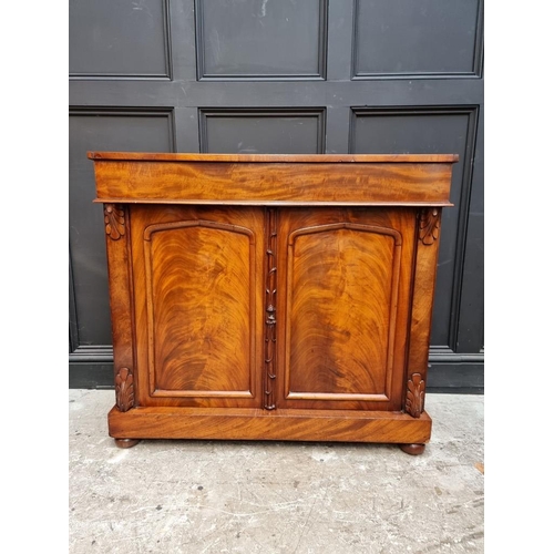 1067 - A Victorian mahogany chiffonier, 107cm wide, (lacking back panels).