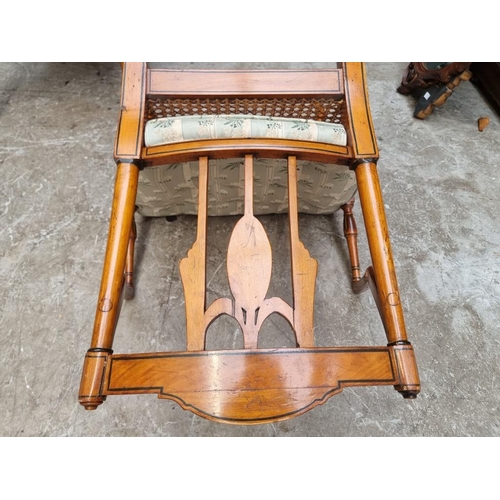 1077 - A pair of antique, Sheraton style, painted satinwood and cane open arm elbow chairs. ... 