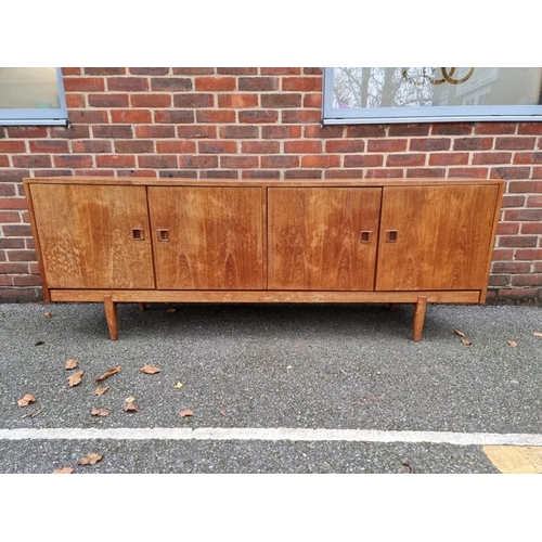 1084 - A mid-century Danish teak sideboard, 200cm wide, (s.d.).