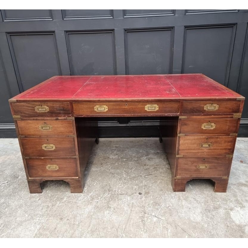 1085 - A large mahogany and brass bound pedestal desk, with countersunk handles, 152.5cm wide. &n... 