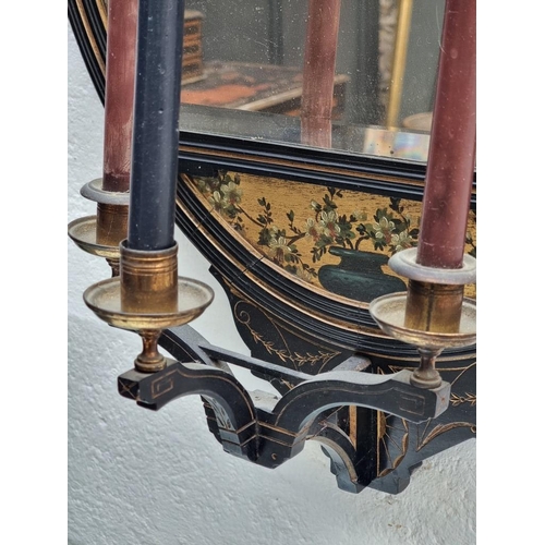 1089 - An Aesthetic ebonized and painted giltwood girandole, 83 x 49cm.