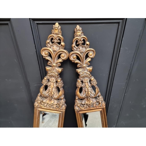 1096 - A pair of reproduction gilt framed pier style mirrors, 121 x 24cm.