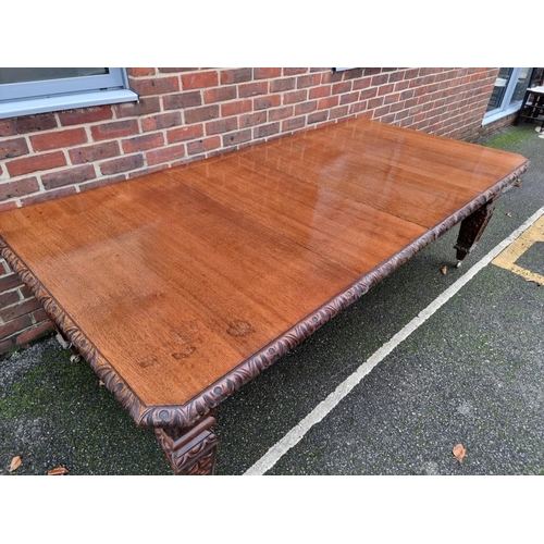 1111 - A Victorian carved oak extending dining table, with two leaf insertions, 235cm extended.... 