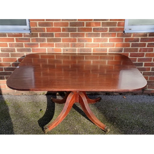 1112 - A 19th century mahogany and line inlaid tilt-top breakfast table, 143cm wide.