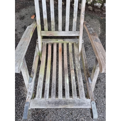 1124 - A Barlow Tyrie teak folding steamer type garden chair.