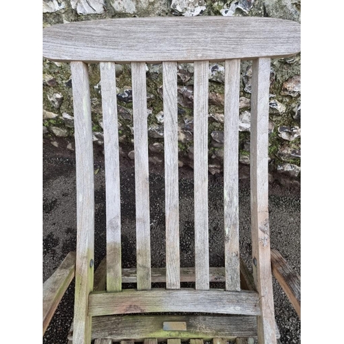 1124 - A Barlow Tyrie teak folding steamer type garden chair.