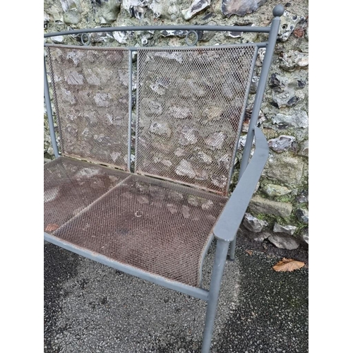 1130 - A metal garden bench, 109cm wide.