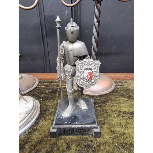 1208 - A pair of brass candelabra, 32cm high; together with a novelty knight lighter; and one other. (4)&nb... 