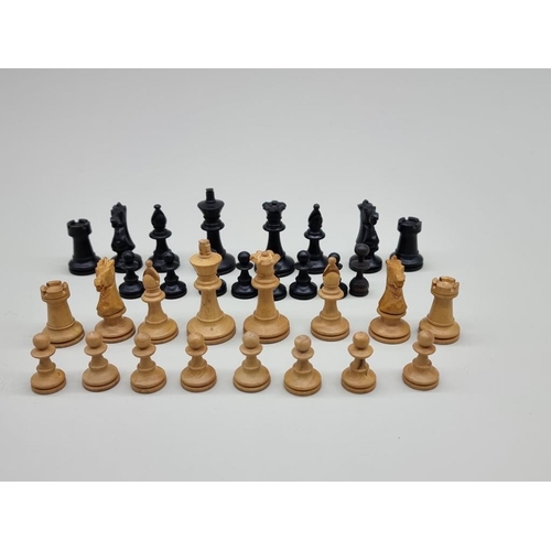 1240 - A boxwood and ebonized Staunton pattern chess set, king 5cm, pawn 2.6cm, in mahogany box, (lacking o... 