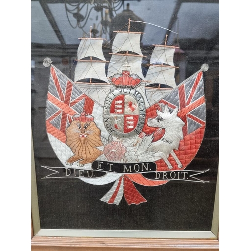 1316 - A Regimental style embroidered panel of the Royal Coat of Arms, incorporating a naval ship, 45.5 x 3... 