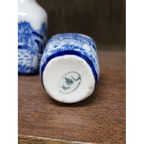 1386 - A collection Chinese and Japanese blue and white vases, largest 14cm high. (8)