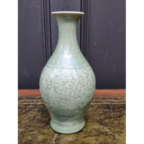 1396 - A Chinese celadon vase, 23cm high; together with a gilt metal 'Three Wise Monkeys' table lamp, total... 