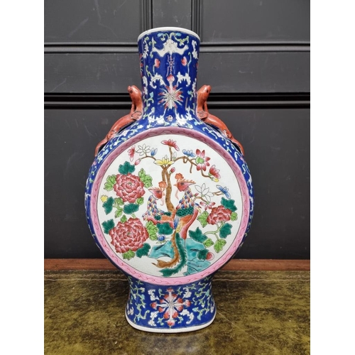 1408 - A large Chinese famille rose twin handled moon flask, 47cm high, (hairline cracks).... 