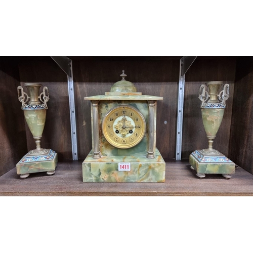 1411 - A matched late 19th century green onyx clock garniture, the clock dial inscribed 'R T Barfoot & ... 