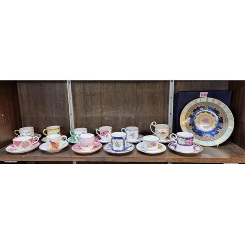 1418 - Twelve Royal Worcester cups and saucers; together with a similar Millennium plate, each boxed. (13)... 