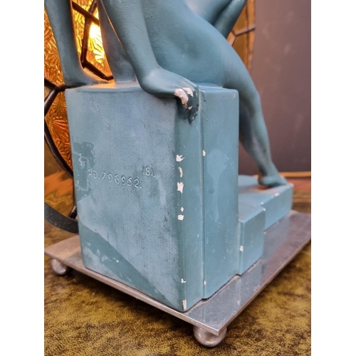 1430 - An Art Deco painted plaster and leaded glass table lamp, 34cm high.