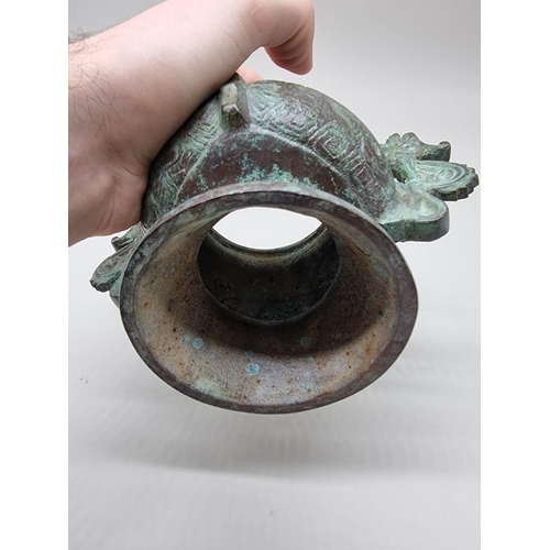 1476 - A Chinese bronze twin handled censer, in Archaistic style, 18cm wide.