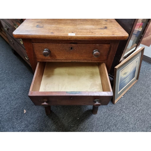 1051 - An unusual 19th century mahogany two drawer printer's table, 56cm wide.