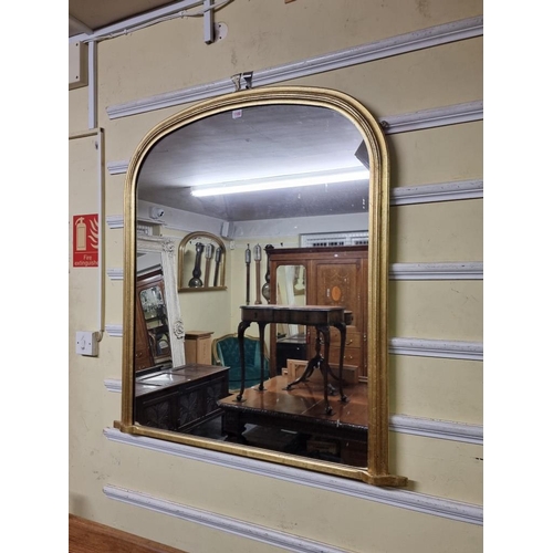 1100 - A reproduction giltwood framed overmantle mirror, 110 x 100.5cm.