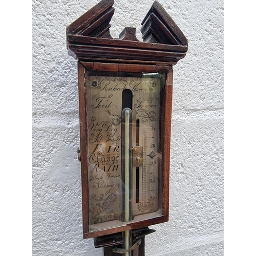 1138 - A George IV mahogany stick barometer, the silvered dial inscribed 'Richard Corin, Penzance 1829', (a... 