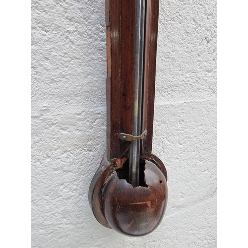 1138 - A George IV mahogany stick barometer, the silvered dial inscribed 'Richard Corin, Penzance 1829', (a... 