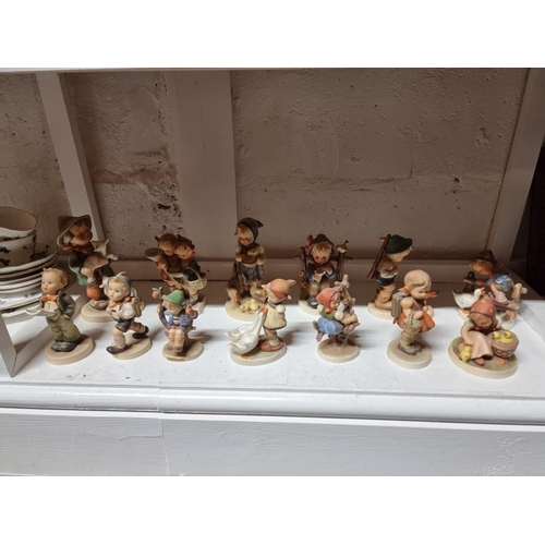 1158 - Thirteen Hummell figures, largest 15.5cm high.