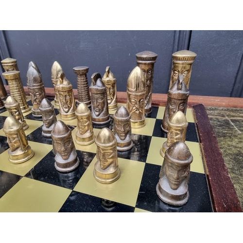 1338 - A brass chess set, king 8cm, pawn 4.2cm, with oak and brass board, 42cm.... 