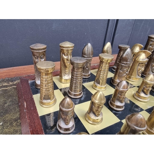 1338 - A brass chess set, king 8cm, pawn 4.2cm, with oak and brass board, 42cm.... 