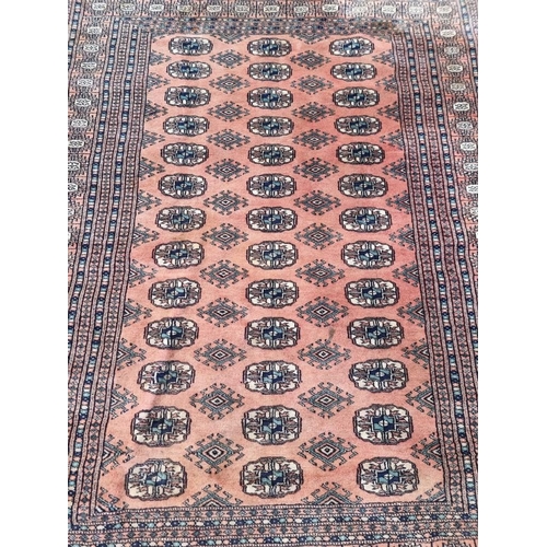 1352 - A Bokhara rug, having repeated allover geometric design, 169 x 132cm.