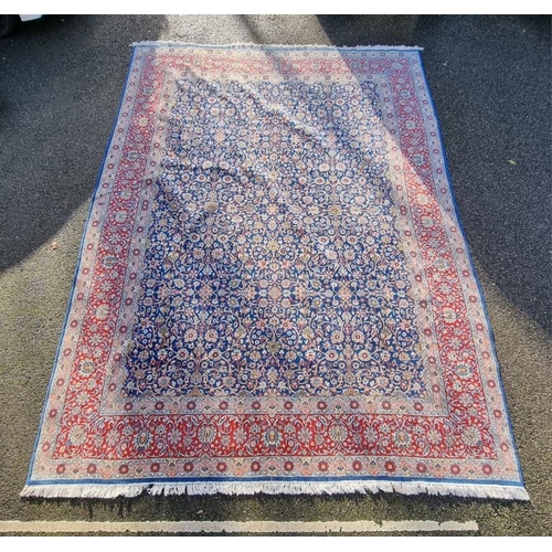 1363 - A large Persian carpet, having allover floral decoration, 415 x 303cm.