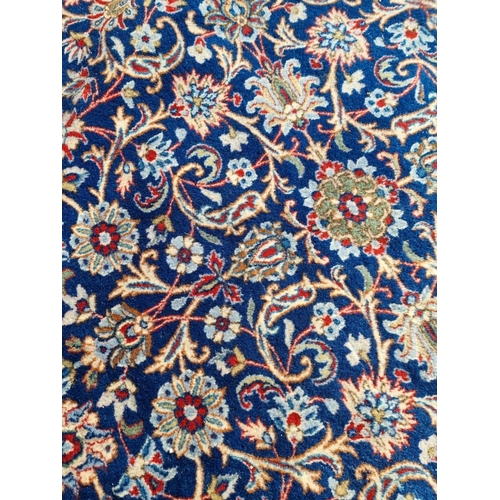 1363 - A large Persian carpet, having allover floral decoration, 415 x 303cm.