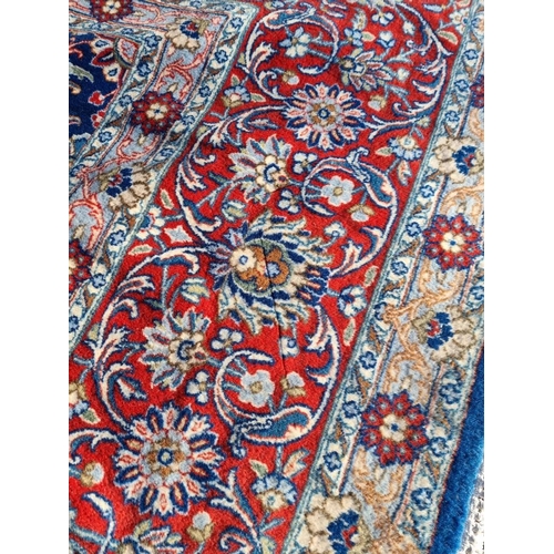 1363 - A large Persian carpet, having allover floral decoration, 415 x 303cm.