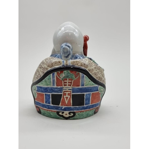 1446 - A Chinese famille verte figure of Shoulau, impressed seal marks to base, 20.5cm high.... 