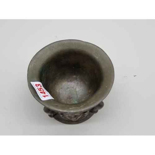 1453 - An antique bronze mortar, possibly 16th century, 7.4cm high x 11cm diameter. 