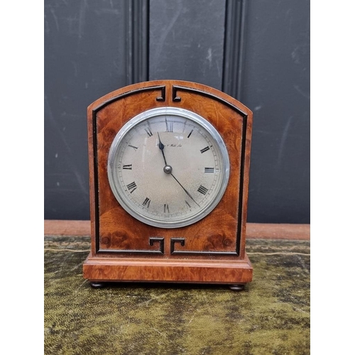 1460 - A small 1930s figured walnut mantel clock, the silvered dial inscribed 'Mappin & Webb Ltd', 17cm... 