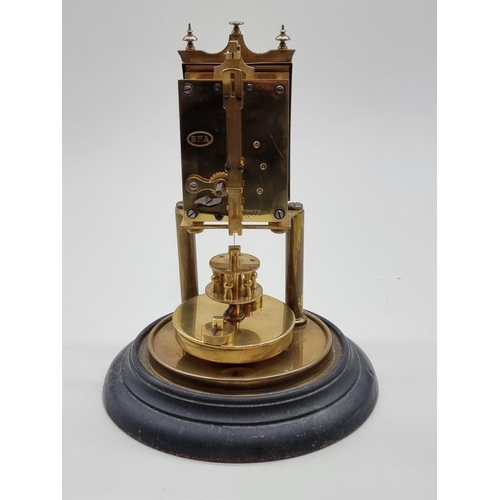 1462 - A brass anniversary clock, with glass dome, 29cm high.