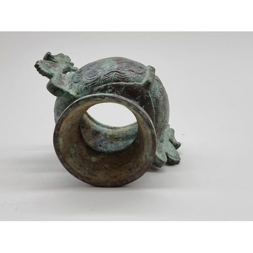 1476 - A Chinese bronze twin handled censer, in Archaistic style, 18cm wide.