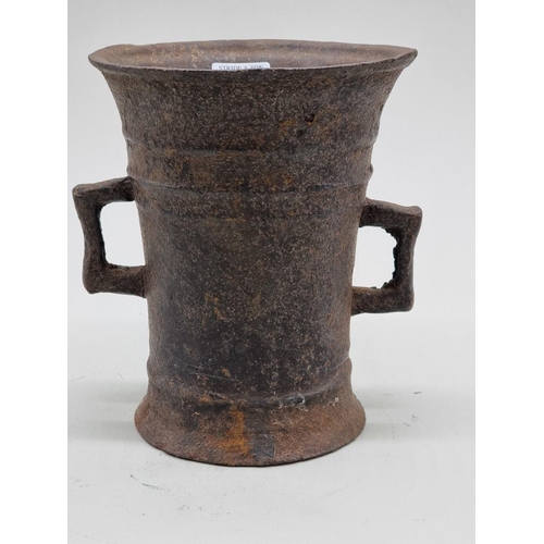 1493 - An antique cast iron mortar, probably German 17th/18th century, 19cm high.