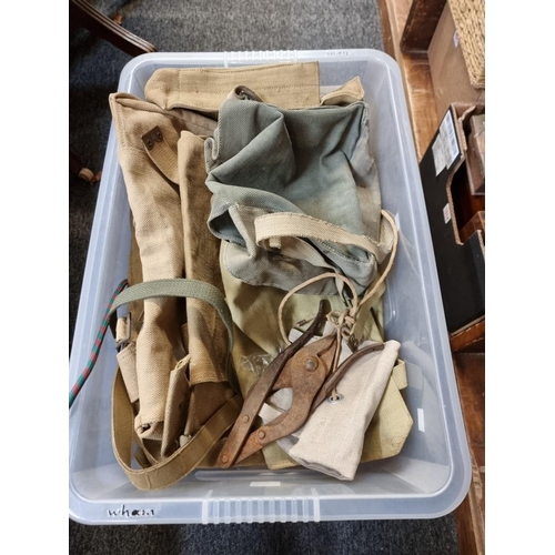 1515 - A collection of 1937 pattern webbing bags; and a pair of folding wire cutters. ... 