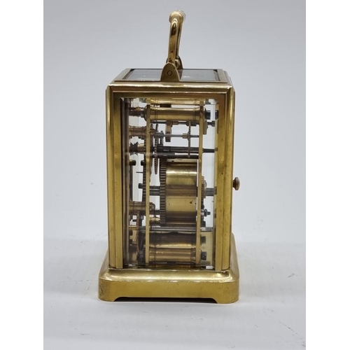 1526 - A good 19th century French brass calendar carriage clock, with subsidiary dials for date and da... 