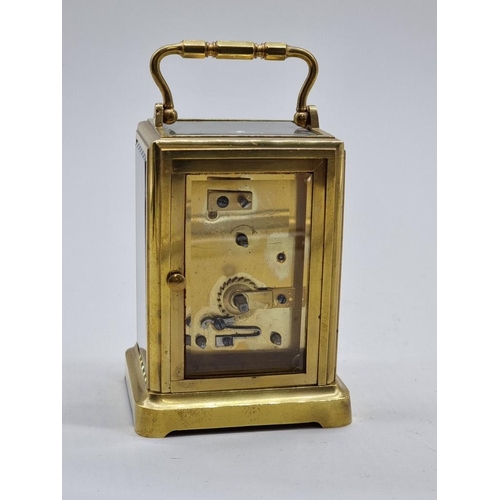 1526 - A good 19th century French brass calendar carriage clock, with subsidiary dials for date and da... 