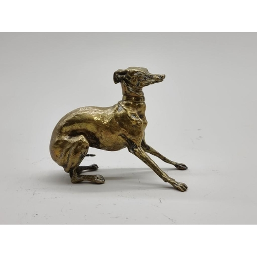 1532 - A small polished bronze whippet, 9.5cm high.